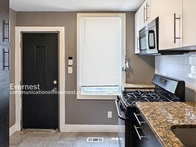 Photo - BALTIMORE SPECIAL! Get $200 OFF Your First Month on This 2 Bed / 2 Bath Townhome with Deck & W/D!