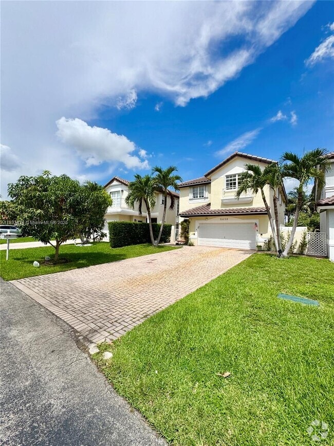 Building Photo - 5630 NW 104th Ct