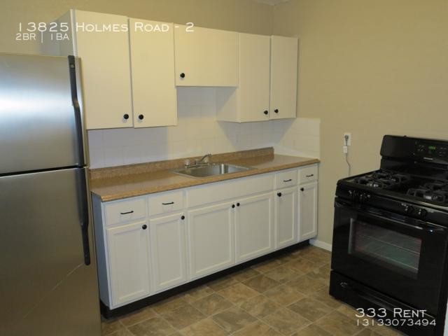 Building Photo - 13825 Holmes Rd