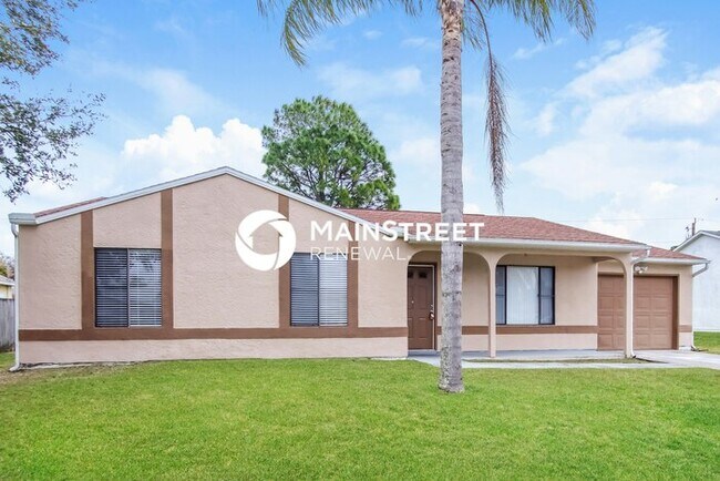 Building Photo - 3 Bedroom Pet-Friendly Home in PALM BAY, FL with Main Street Renewal