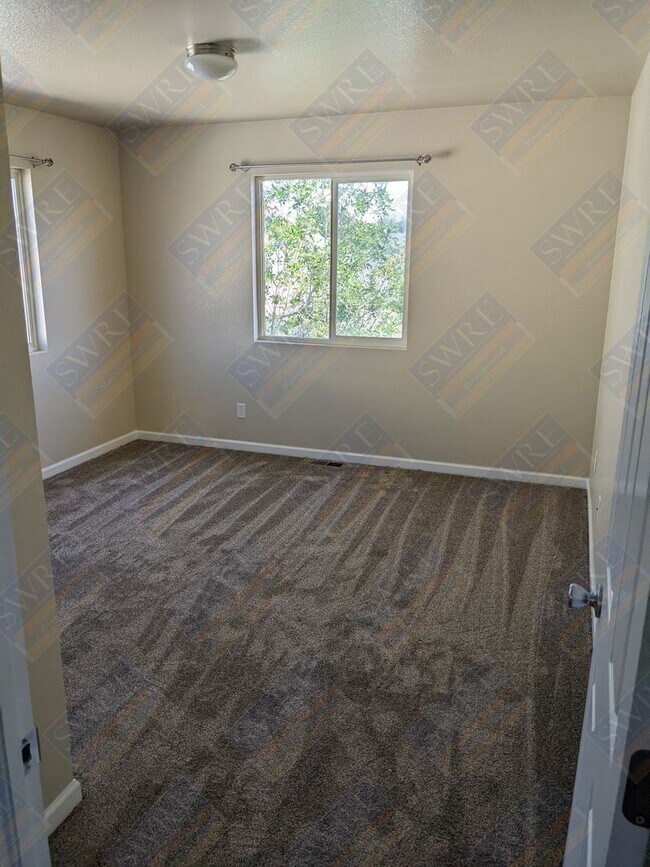 Building Photo - Available Now! Call 307.219.4881 to schedu...