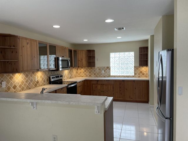 Foto del edificio - 5605 Rambler Rose Way