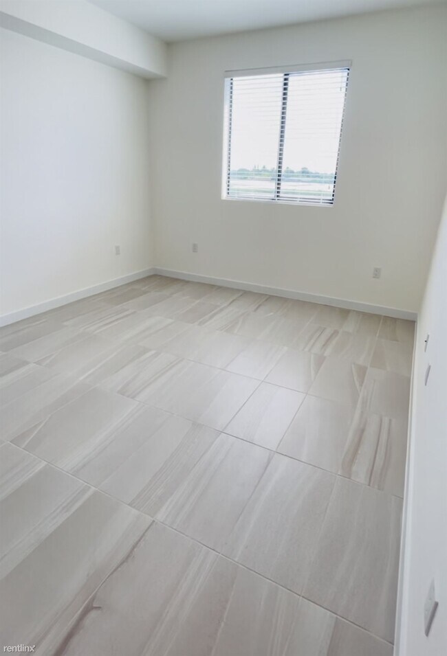 Building Photo - 1 br, 1 bath Condo - 7321 NW 46th St NEW B...
