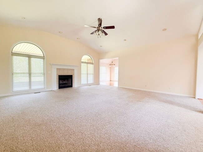 Building Photo - Bright 3-Bedroom Home with Sun Room, Fireplace & Two-Car Garage