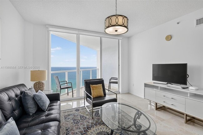 Building Photo - 16699 Collins Ave