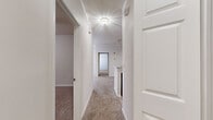 Welcome to your new beginning at 611 Grosslake Pkwy, where aspirations become reality. This meticulously designed 2-bedroom, 3-bathroom haven offers 1050 square feet of limitless possibilities. The heart of this home is the inviting living area, where natural light cascades through elegant windows, creating an ambiance of warmth and tranquility.

The kitchen is a culinary enthusiast's dream, featuring pristine white cabinetry, sleek countertops, and modern appliances. It's the perfect canvas for creating memorable meals and entertaining loved ones. The open concept seamlessly connects the kitchen to the living space, fostering a sense of togetherness and flow.

Retreat to the primary bedroom, a generous 170 square foot sanctuary that promises restful nights and rejuvenating mornings. The en-suite bathroom, along with two additional well-appointed bathrooms, offers spa-like comfort and convenience.

Plush carpeting in the bedrooms provides a cozy touch, while the wood-look flooring in common areas adds a contemporary flair. The laundry room ensures effortless household management, and ample closet space throughout keeps your life organized and clutter-free.

Large windows in every room invite nature's beauty indoors, creating an ever-changing artwork of natural vistas. This home isn't just a place to live; it's a canvas for your dreams, a foundation for your future, and a testament to your success. Experience the joy of coming home to a space that truly reflects your aspirations and lifestyle.