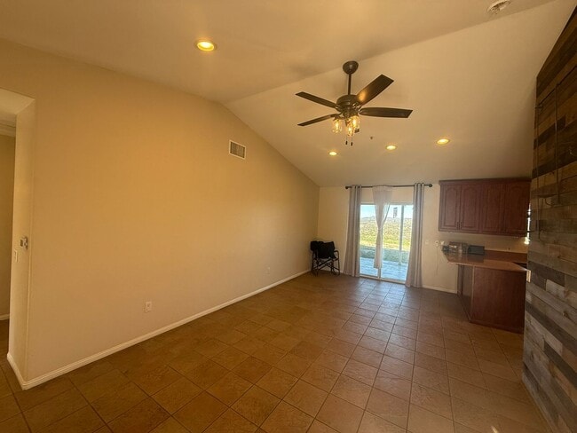 Building Photo - 4BR/2BA HOME w/ attached garage, usable land, fenced in back yard in CAMPO available!