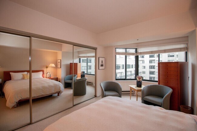 Building Photo - Two Bedrooms, Two Baths Condo Semi-furnish...