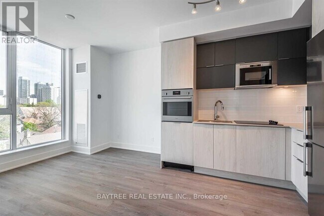 Photo du bâtiment - 1 Belsize Dr