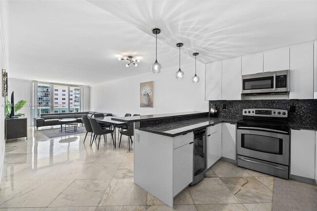 Building Photo - 19380 Collins Ave