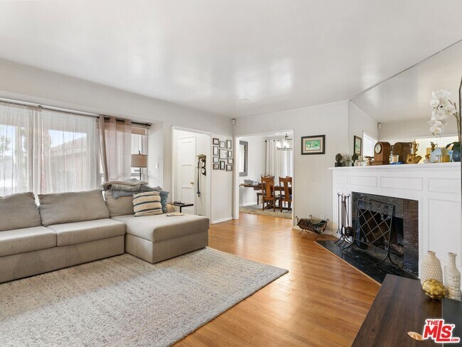 Living Room into Dining Room - 7512 Flight Ave