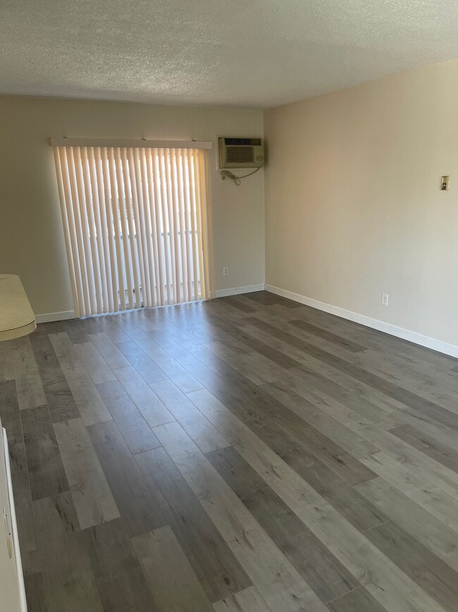 Living area and Balcony - 10729 New Haven St