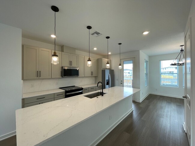 Building Photo - 3 Bedroom, 3.5 Bath Townhome with 2 Car Ga...