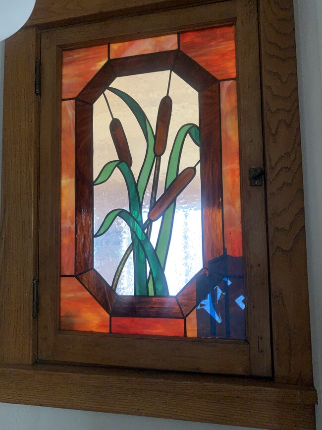 Stained glass window - 100 Howell St N