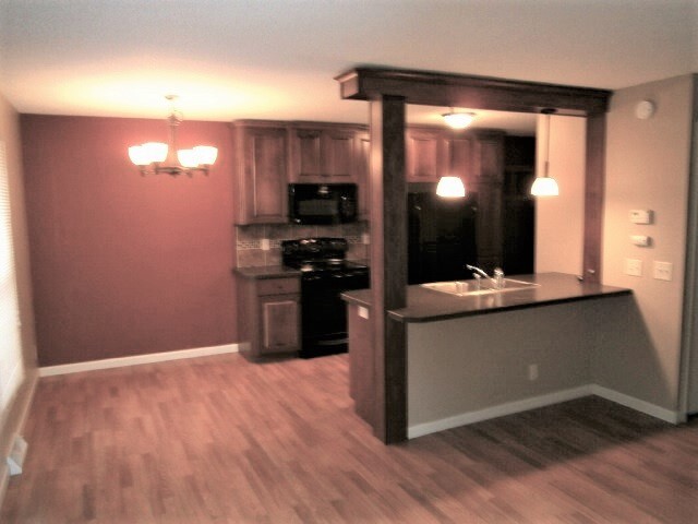 Building Photo - 4958 Grenwich Trl N