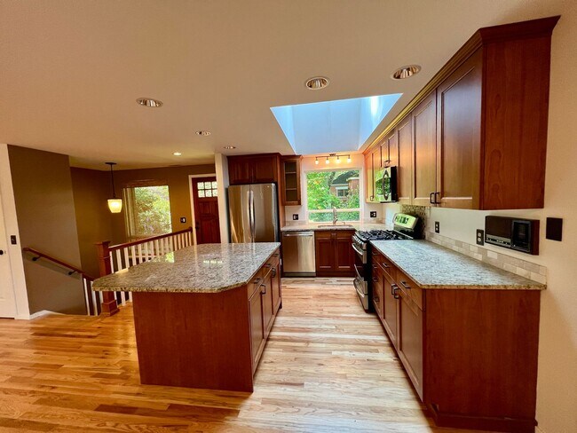 Building Photo - Spacious and Serene: Stunning 4-Bedroom Re...