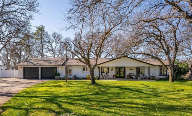 Building Photo - A Private Oasis with Unmatched Amenities 4 Bedroom 3 Bath
