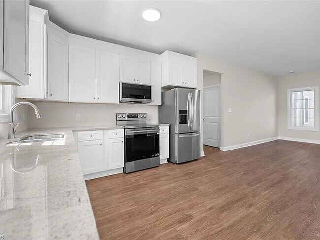 Building Photo - Earn Wealth While Leasing - Like a Homeown...