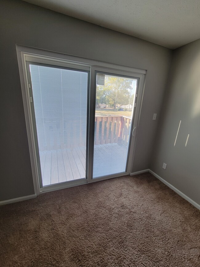 patio/balcony door - Courts of Colfax Apartments