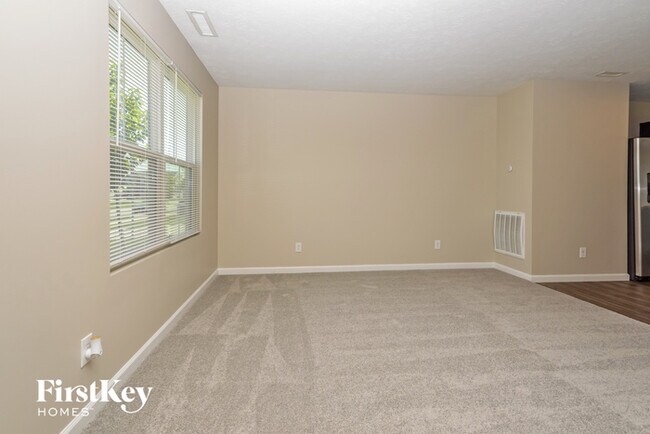 Building Photo - 7079 E Mardenis Drive S