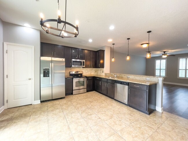 Building Photo - Beautiful 3 story townhome in St Johns Town center area