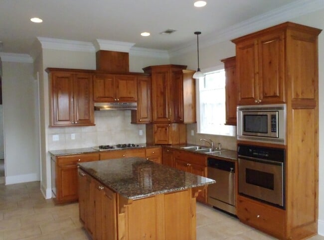 Building Photo - Custom 4 bedroom home in Manchac Harbor/Pr...