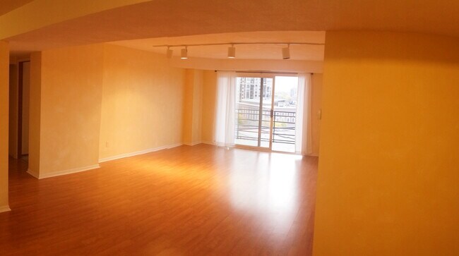 View of living room from front door - 121 Washington Ave S