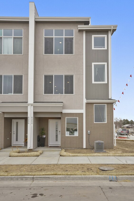 The Rowhomes at Greyhound Park Apartments in Commerce City, CO
