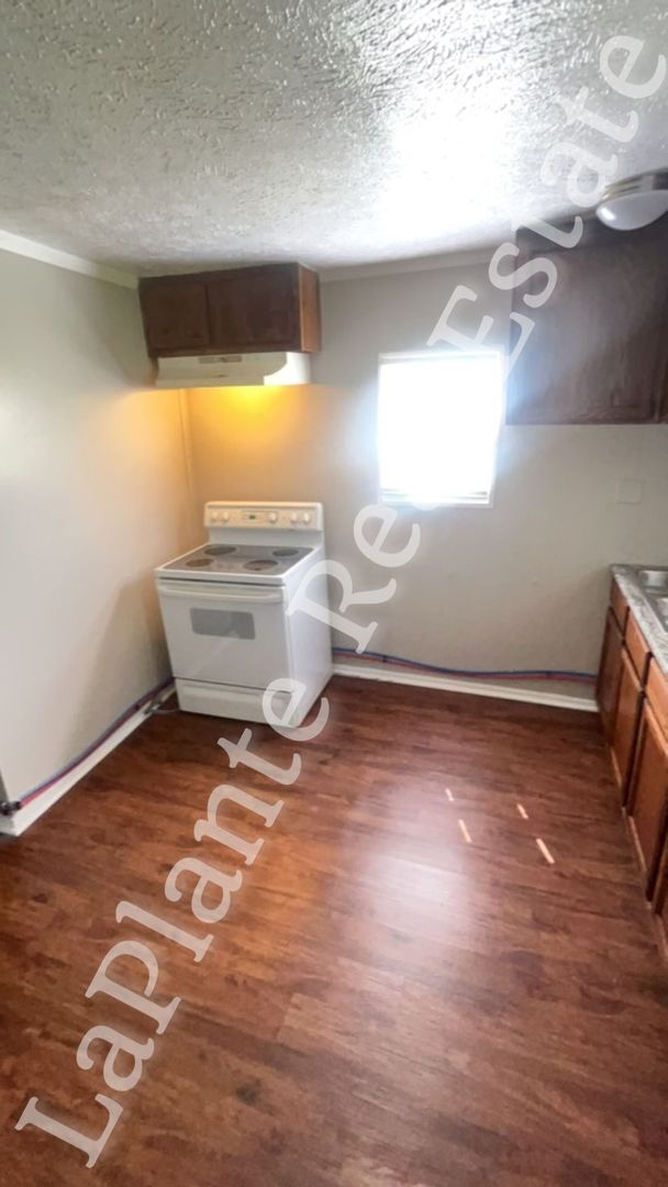 Foto del edificio - Charming and cozy 3-Bedroom Home with Fenced Yard