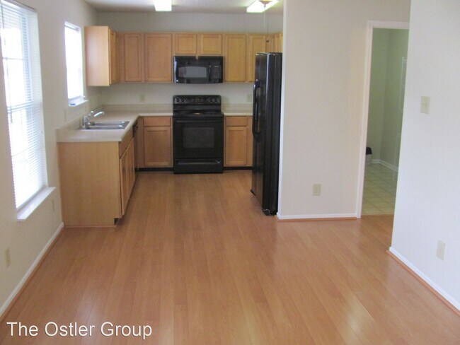 Building Photo - 4 br, 2.5 bath House - 10807 Emery Dr.