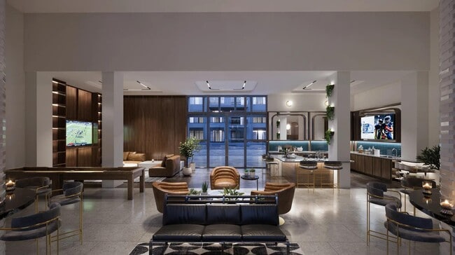 Expansive clubroom with gathering space, demonstration kitchen, and shuffleboard. - Modera SoBro