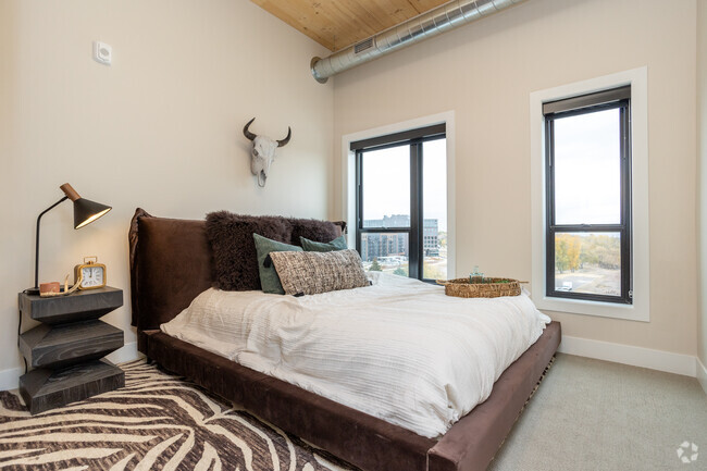 2BR, 2BA - 1,093SF - Primary Bedroom - The Clark Lofts at Cherapa Place