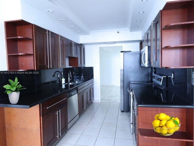 Building Photo - 20191 E Country Club Dr