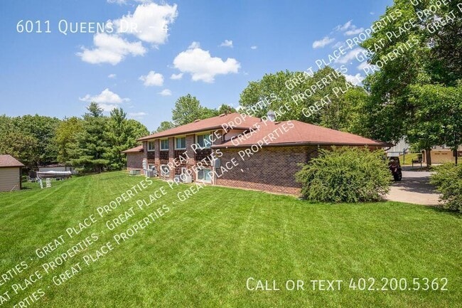 Building Photo - 6011 Queens Dr