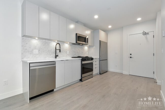 Building Photo - Contemporary 1-Bed Condo at Pura by Adera in Surrey City Centre