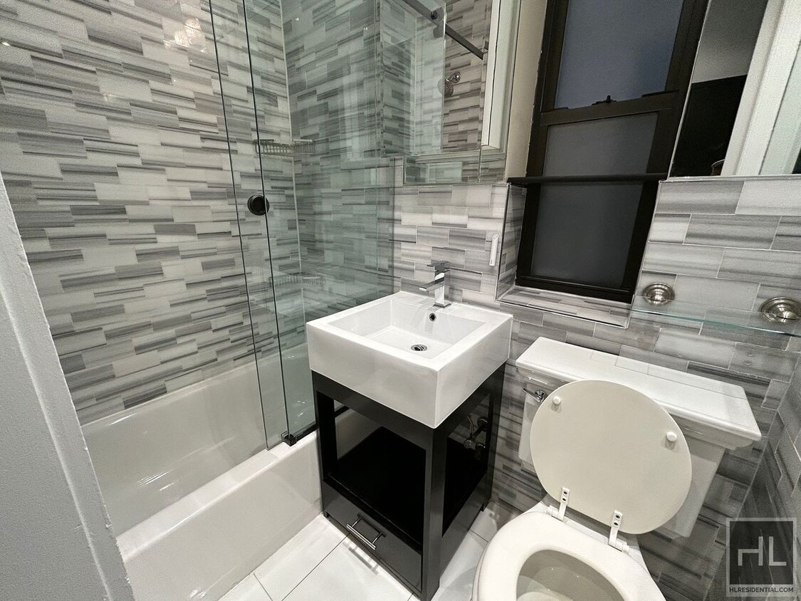 Building Photo - E 8TH ST.