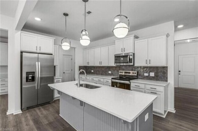 Building Photo - Spacious 3-Bedroom Townhome with Private Patio, Central HVAC & In-Unit Laundry Hookups