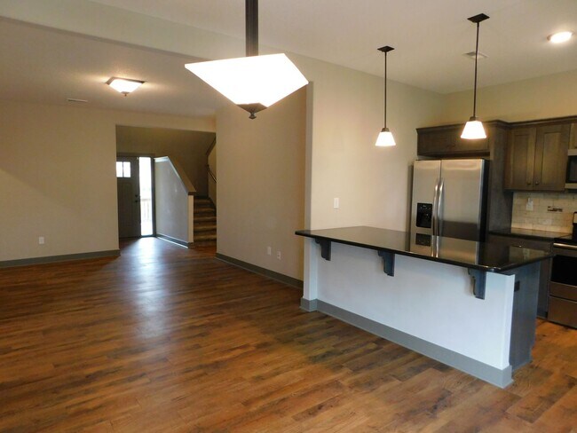 Building Photo - Incredible townhome with double car garage...