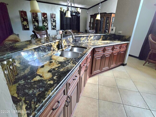 Foto del edificio - 6931 Cane Grass Ln E