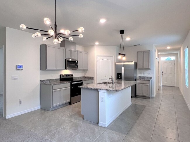 Building Photo - Four-Bedroom Home with Modern Finishes & Open Layout