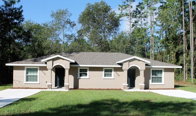 Building Photo - 9210-9210 N Travis Dr