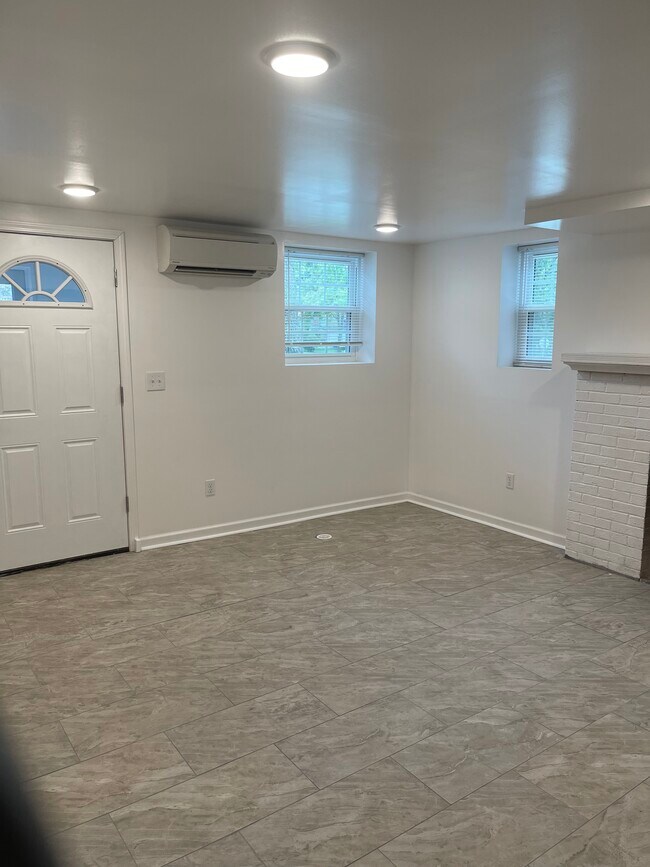 Living room towards entry door - 300 E Upland Rd