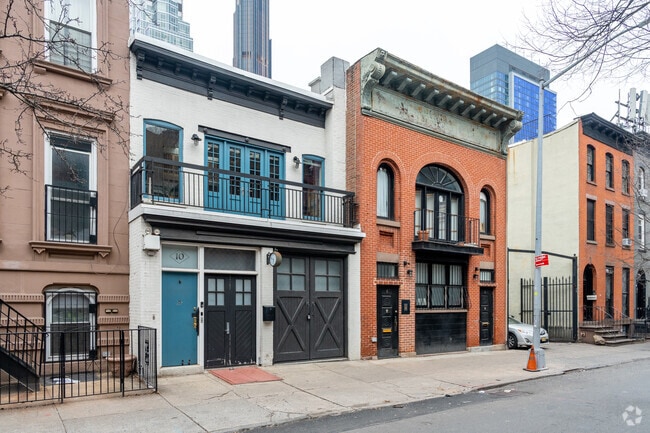 The colorful cottage homes of Fort Greene brighten the neighborhood streets.