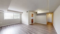 Located at 3325 Walters Ln in District Heights, MD, this single-floor residence offers three bedrooms, two bathrooms, and a practical, well-organized layout. The open living area greets you with light gray luxury vinyl plank flooring that flows seamlessly throughout the main spaces, complemented by neutral-toned walls that create a clean, versatile backdrop. Natural light streams in through multiple windows, giving the living area an open, airy feel with views of surrounding greenery.

The kitchen is efficiently designed with warm honey-toned wood cabinetry, dark laminate countertops, a gas range, and a window that brings in additional natural light. It connects conveniently to the main living space, supporting an easy flow for daily living.

The three bedrooms are carpeted in neutral tones, providing comfort underfoot, and each features windows that allow natural light to fill the rooms. The generously sized primary bedroom offers ample space for furnishings. Two closets provide dedicated storage throughout the unit.

The two bathrooms are clean and functional — one features a full tub/shower combination with white tile surround and a vanity with storage, while the second is a more compact space with wood-tone LVP flooring. A utility room and hallway round out the thoughtfully arranged floor plan.