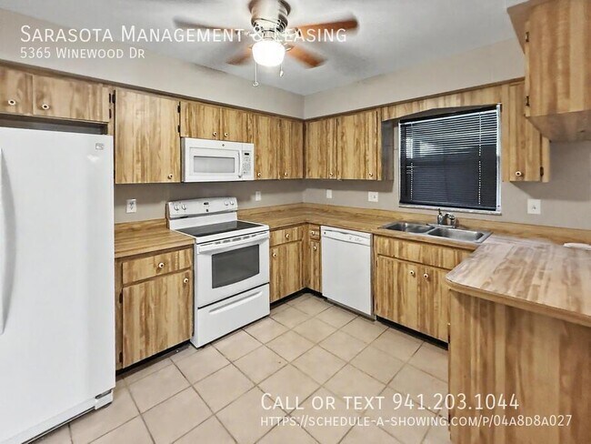 Foto del edificio - 5365 Winewood Dr