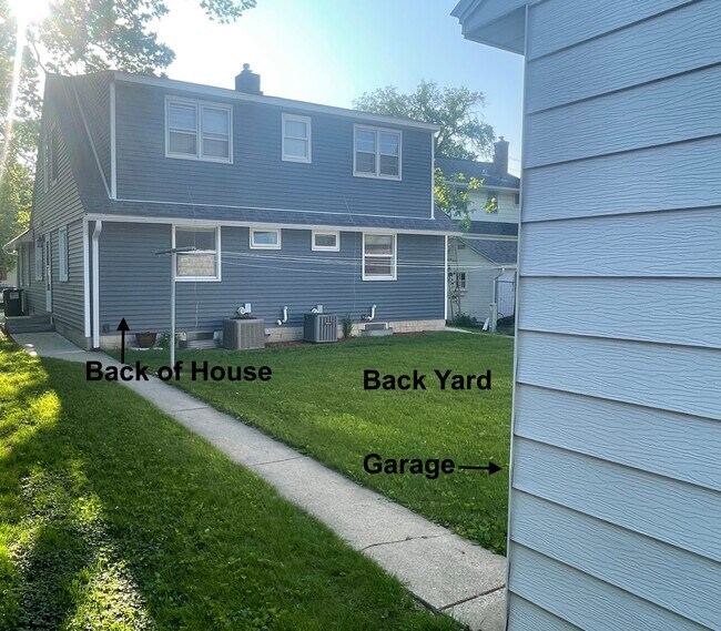 Back of house, back yard, garage - 210 7th Ave NW