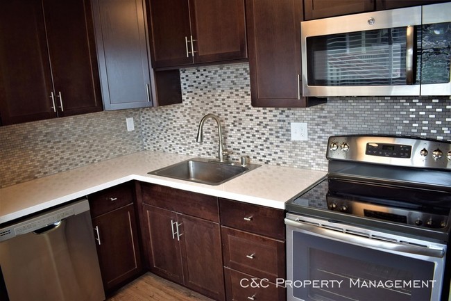 Building Photo - Remodeled Apartment with Private Garage