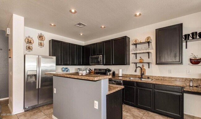 Foto del edificio - 14982 W Columbine Dr