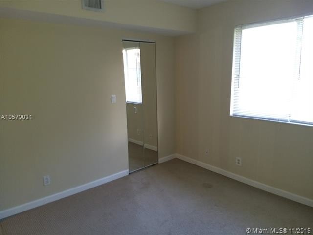 Building Photo - 701 Gardens Dr