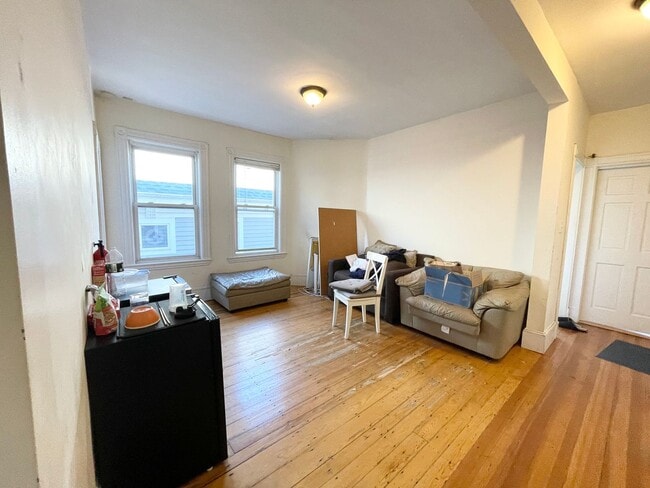 Building Photo - Modern 4-Bedroom on Sachem St — In-Unit Laundry • Updated Kitchen • Prime Mission Hill